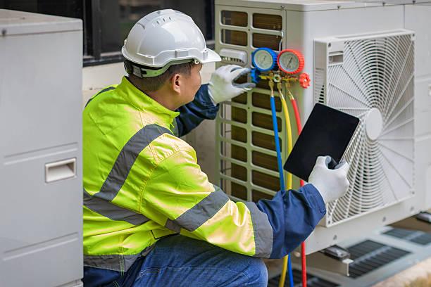 Professional Ductwork Repair technician working in Bettendorf, IA